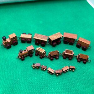 Miniature Wooden Trains. 8", 6", 3". (925)